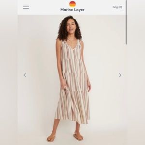 Long summer dress with stripes.